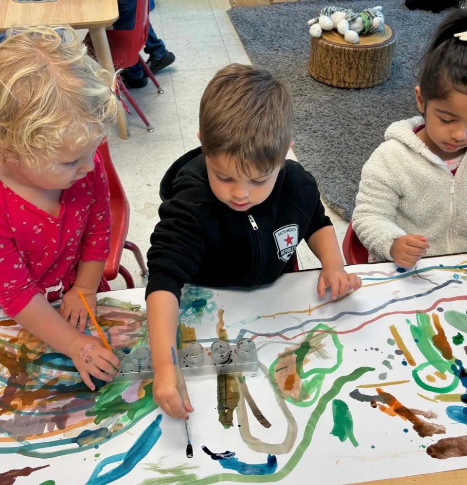 Children painting at Inspire