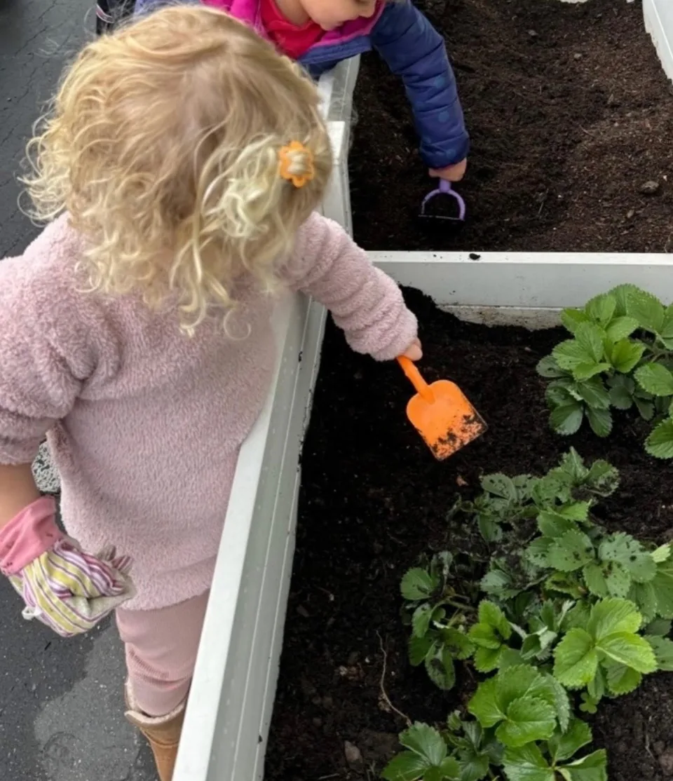 Children gardening at Inspire